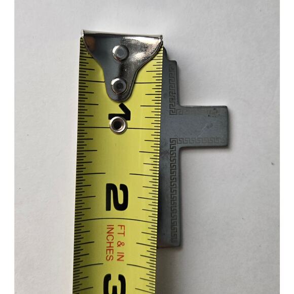 Silver Toned Cross Pendant with Gold Tone Embellishments Around the Edges - Picture 4 of 5